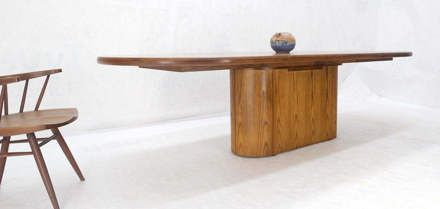 Single Pedestal Base Oval racetrack Shape Two Leaves Cerused Oak Dining Table