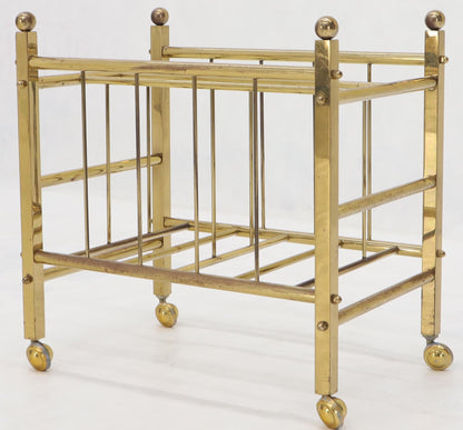 Pair of Mid-Century Modern Polished Brass Magazine Racks on Metal Casters