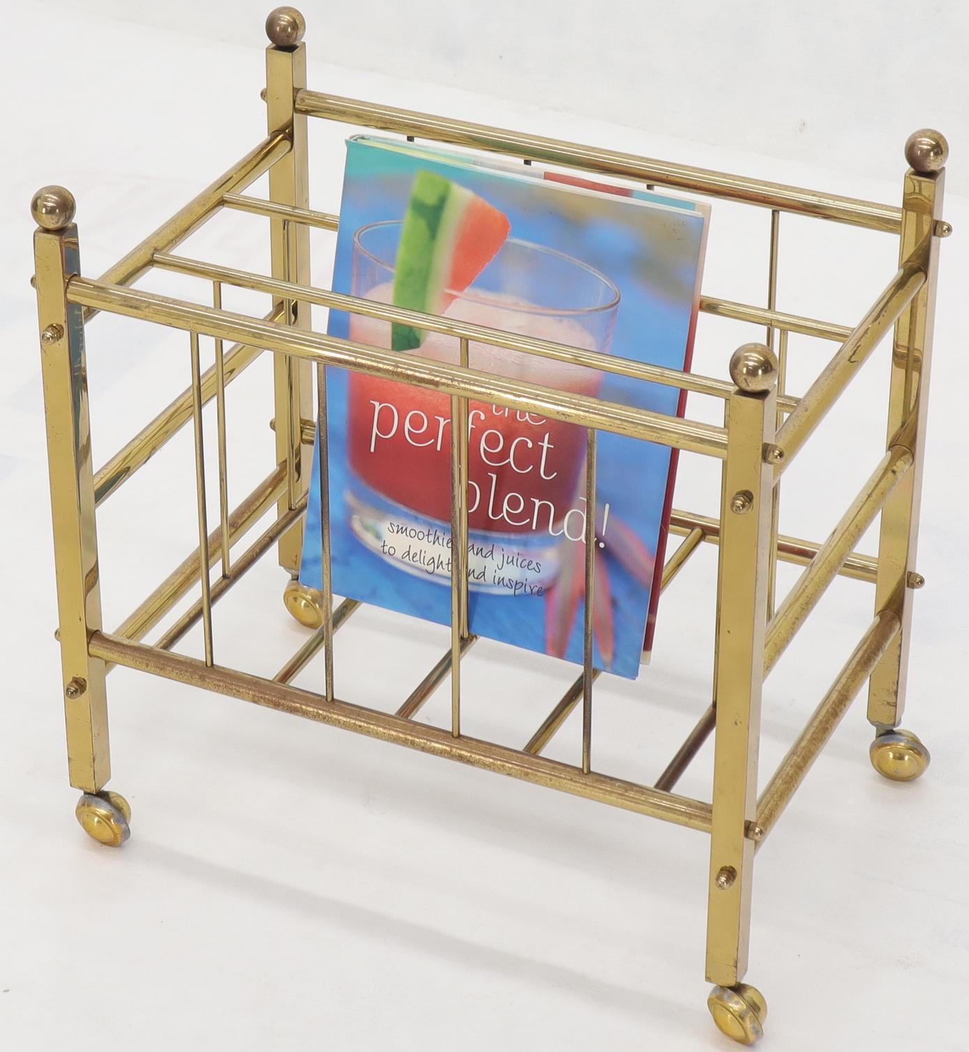 Pair of Mid-Century Modern Polished Brass Magazine Racks on Metal Casters