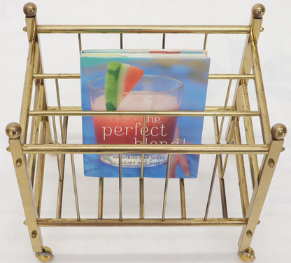 Pair of Mid-Century Modern Polished Brass Magazine Racks on Metal Casters