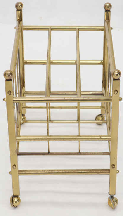 Pair of Mid-Century Modern Polished Brass Magazine Racks on Metal Casters