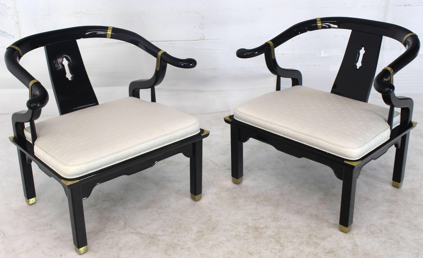 Pair of Black Lacquer Brass Hardware Horse Shoe Barrel Back Lounge Chairs