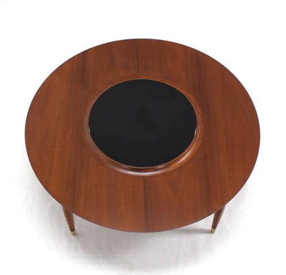 Round Walnut Coffee Table with Raised Black Laminate Lazy Susan Center